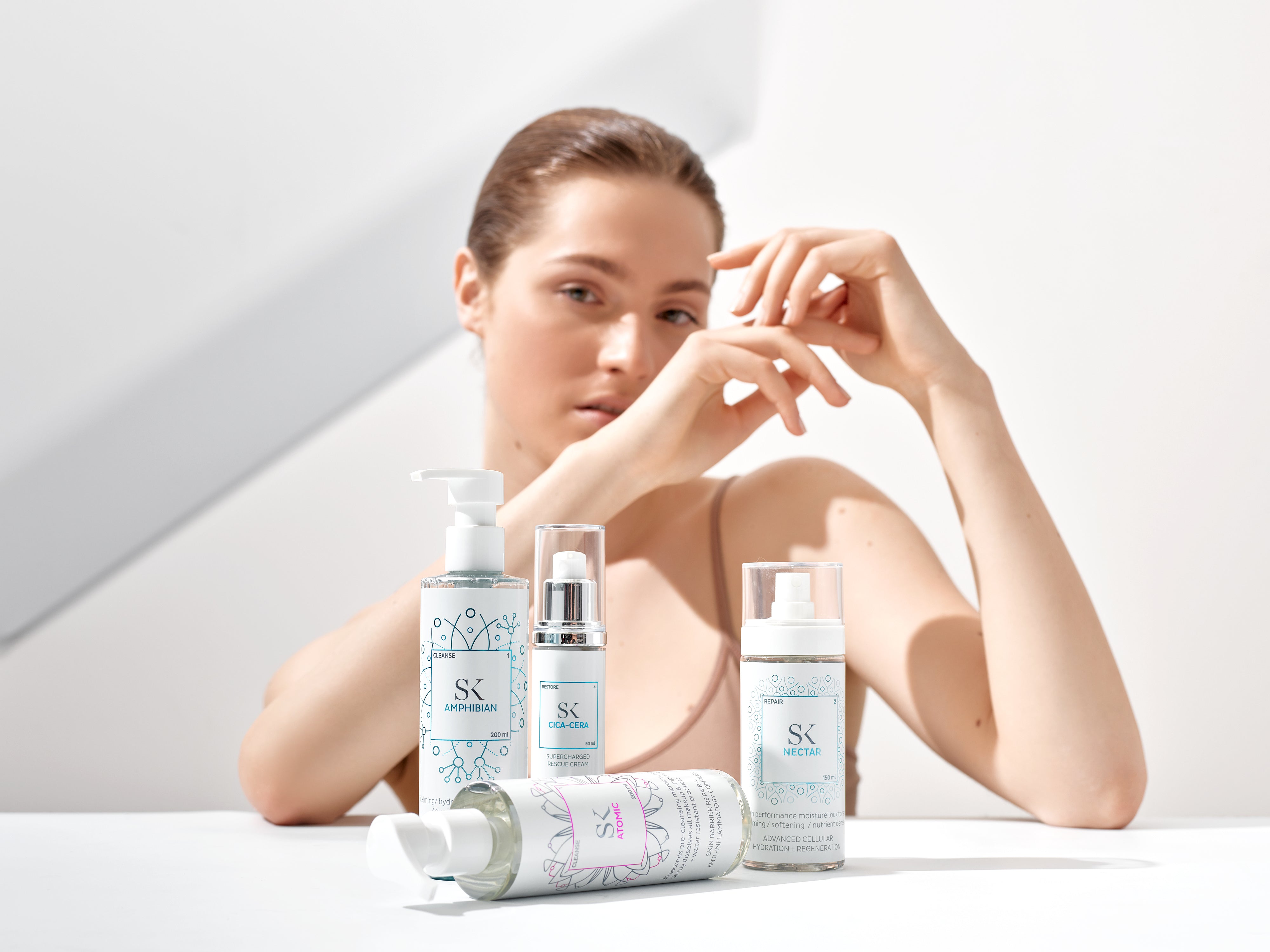 Model with Skintegra products in front