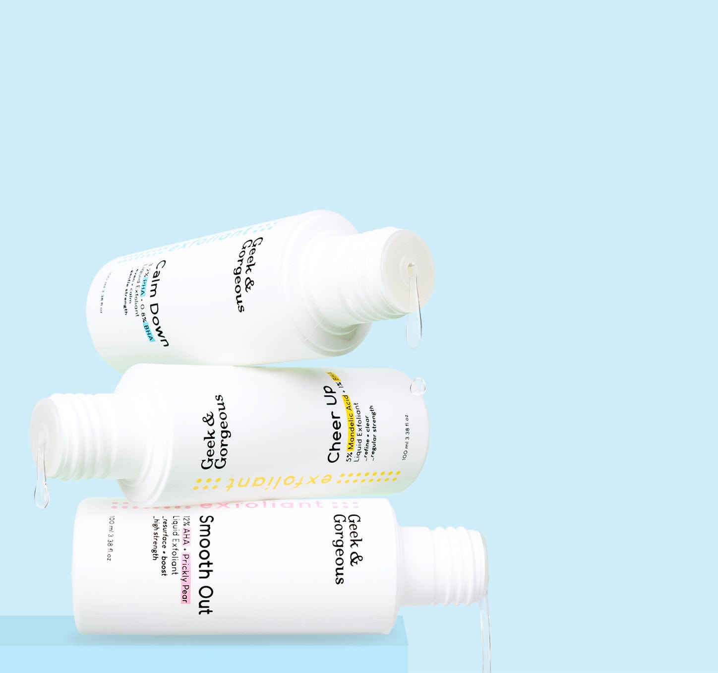 Geek & Gorgeous Exfoliant Toners piled up with blue background