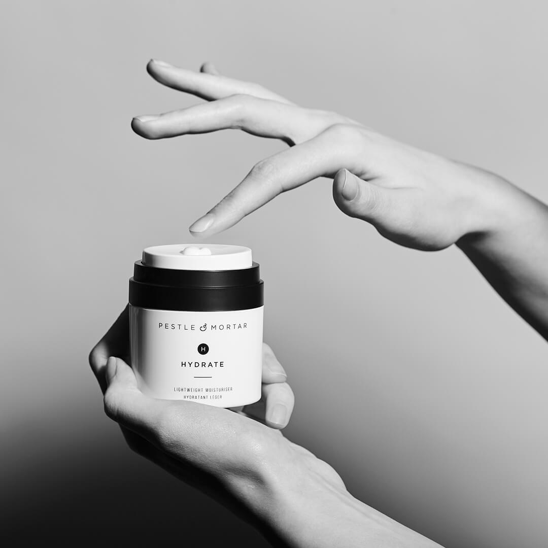 Pestle & Mortar Hydrate Moisturizer with hand